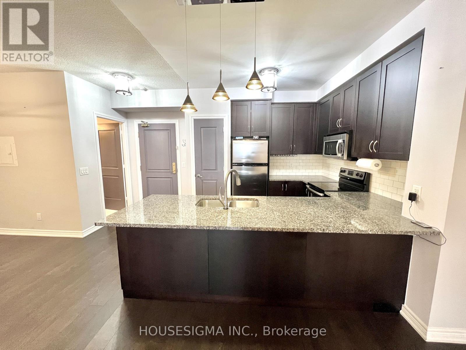 406 - 9245 Jane Street, Vaughan, Ontario  L6A 0J9 - Photo 2 - N12777162