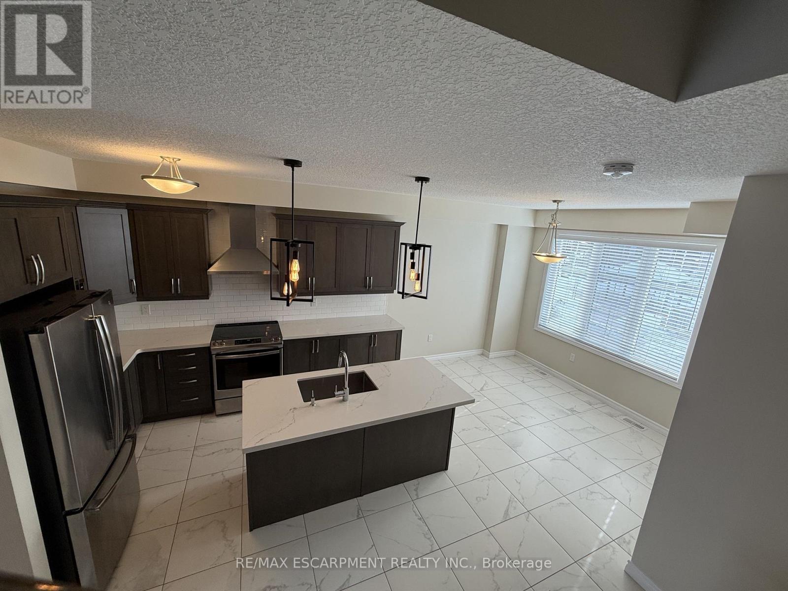 35 - 445 Ontario Street S, Milton (Tm Timberlea), Ontario  L9T 9K3 - Photo 6 - W12777120