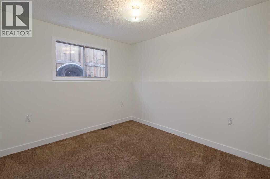 256 Queen Tamara Way Se, Calgary, Alberta  T2J 4E7 - Photo 34 - A2278377