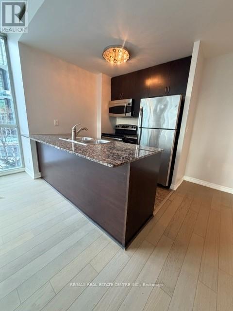 711 - 223 Webb Drive, Mississauga, Ontario  L5B 3W4 - Photo 4 - W12776640