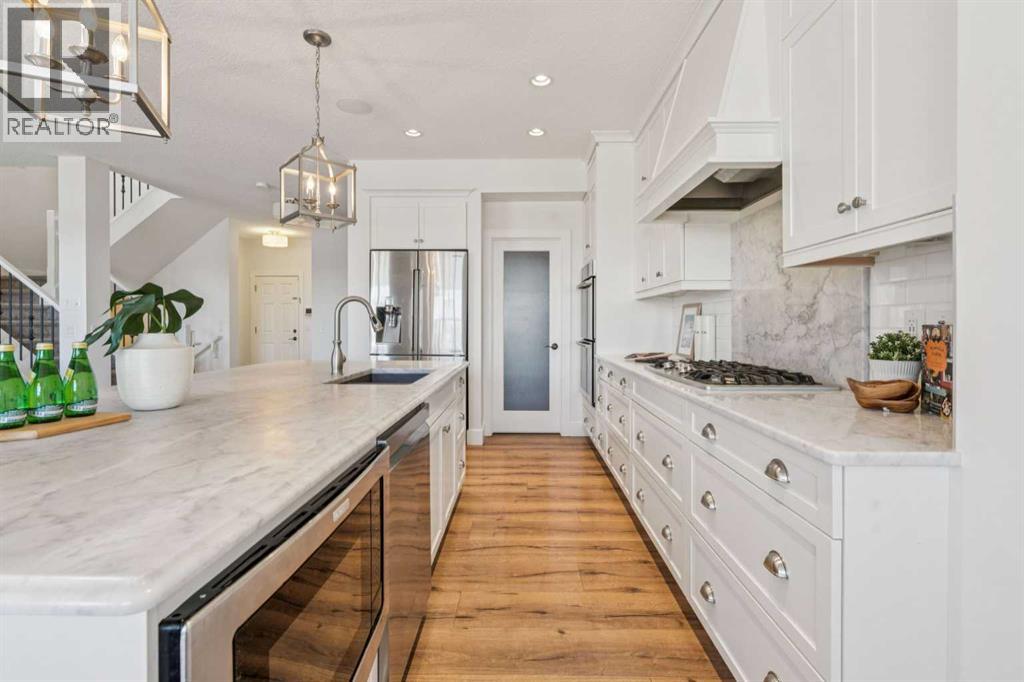 47 Sundown Way, Cochrane, Alberta  T4C 0H4 - Photo 3 - A2282998