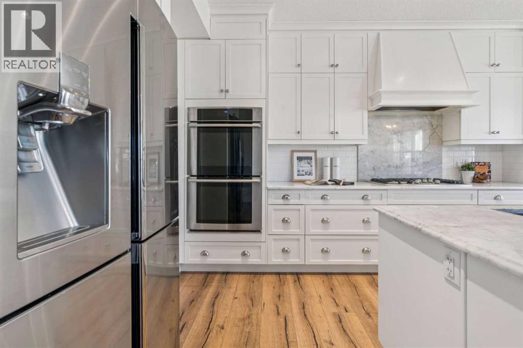 47 Sundown Way, Cochrane, Alberta  T4C 0H4 - Photo 4 - A2282998