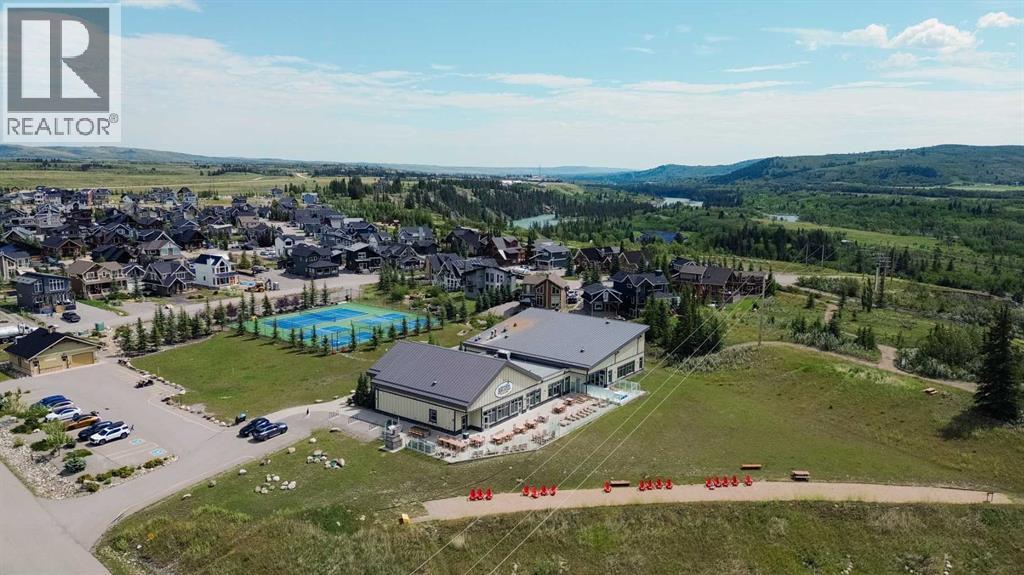 236 Cottage Club Crescent, Rural Rocky View County, Alberta  T4C 1B1 - Photo 10 - A2245247