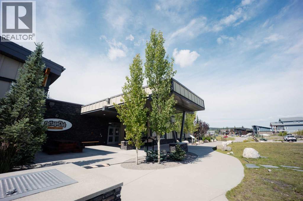 236 Cottage Club Crescent, Rural Rocky View County, Alberta  T4C 1B1 - Photo 8 - A2245247