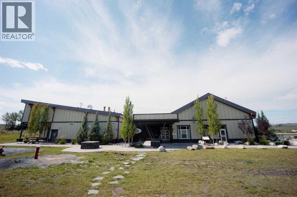 236 Cottage Club Crescent, Rural Rocky View County, Alberta  T4C 1B1 - Photo 9 - A2245247