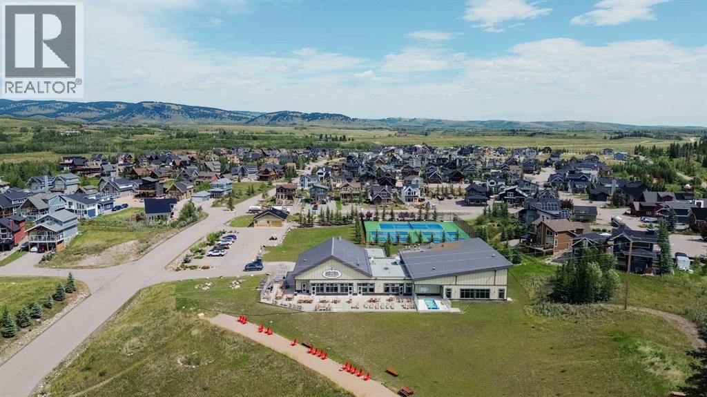 236 Cottage Club Crescent, Rural Rocky View County, Alberta  T4C 1B1 - Photo 29 - A2245247