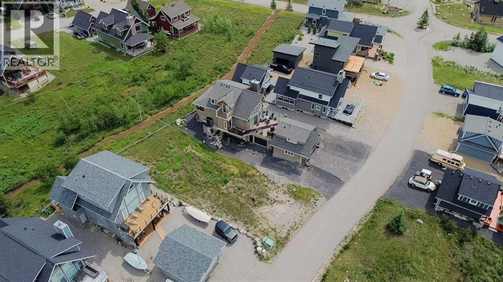 236 Cottage Club Crescent, Rural Rocky View County, Alberta  T4C 1B1 - Photo 28 - A2245247