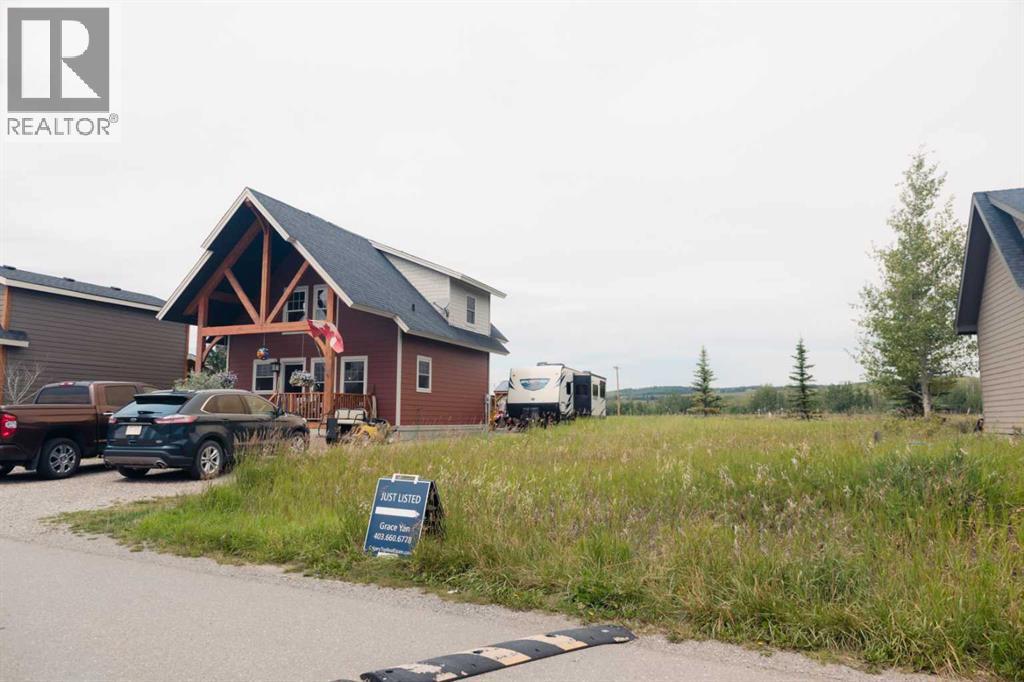 236 Cottage Club Crescent, Rural Rocky View County, Alberta  T4C 1B1 - Photo 19 - A2245247