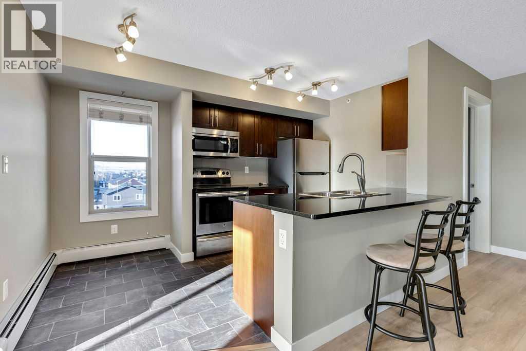 7402, 403 Mackenzie Way Sw, Airdrie, Alberta  T4B 3V7 - Photo 3 - A2278236