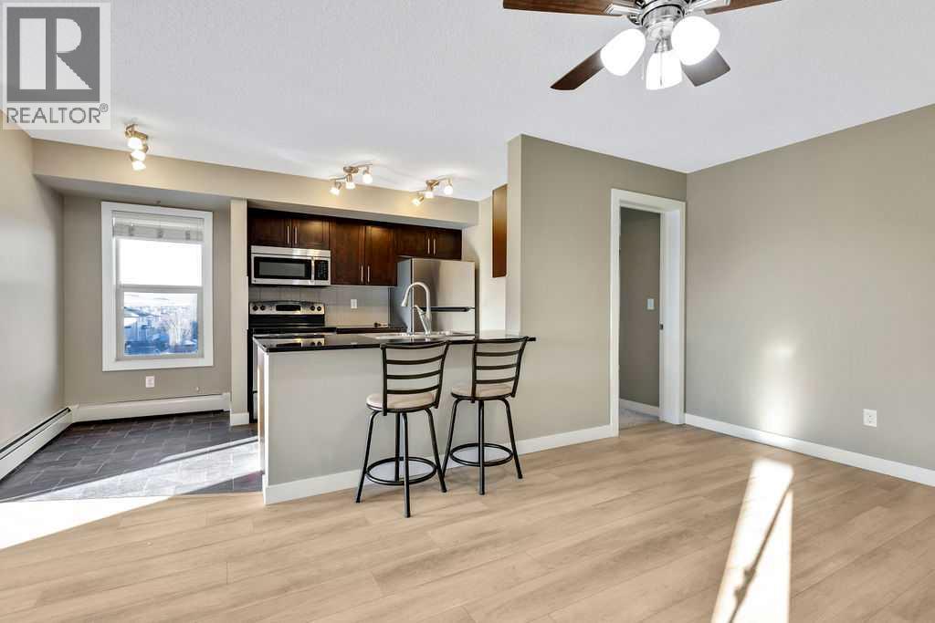 7402, 403 Mackenzie Way Sw, Airdrie, Alberta  T4B 3V7 - Photo 2 - A2278236