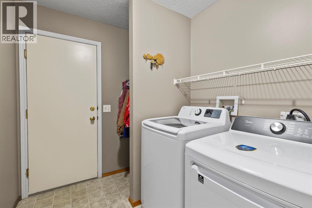 161 West Lakeview Drive, Chestermere, Alberta  T1X 1H7 - Photo 34 - A2283649