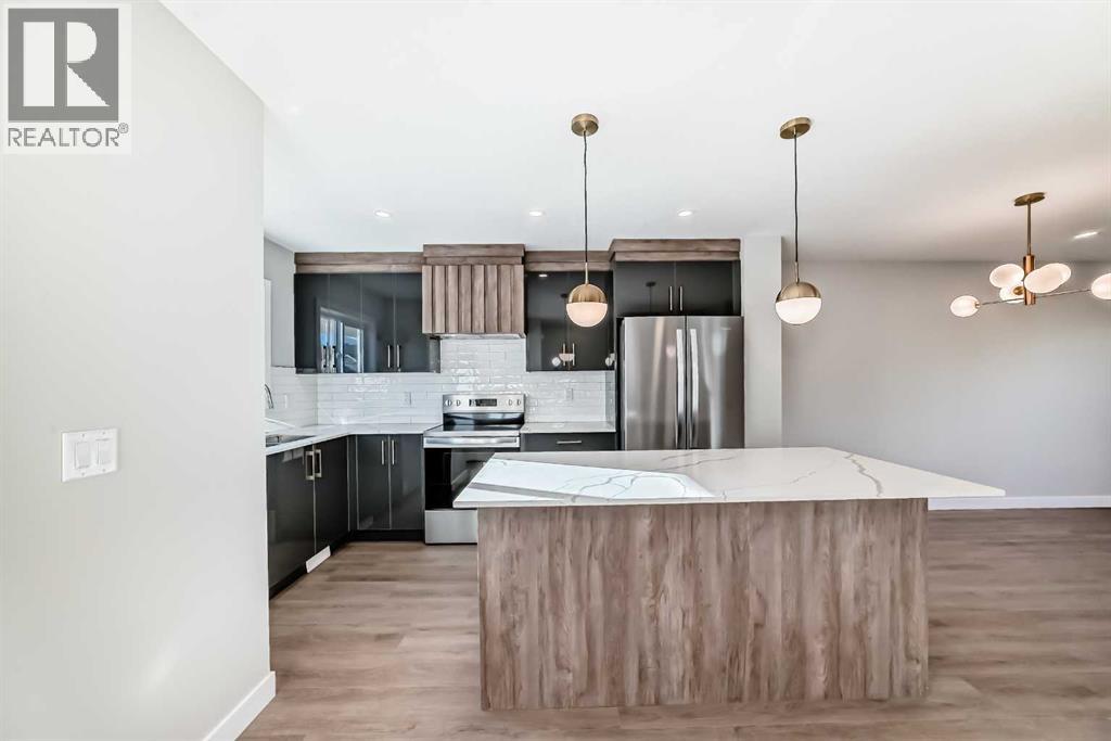 703 Clover Road, Carstairs, Alberta  T0M 0N0 - Photo 10 - A2278310