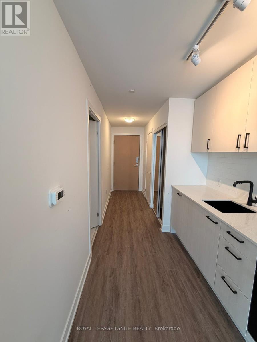 1217 - 1 Quarrington Lane, Toronto, Ontario  M3C 0S4 - Photo 3 - C12777586