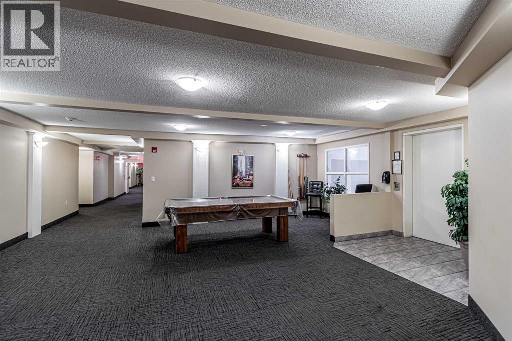 216, 6800 Hunterview Drive Nw, Calgary, Alberta  T2K 6K5 - Photo 5 - A2278413