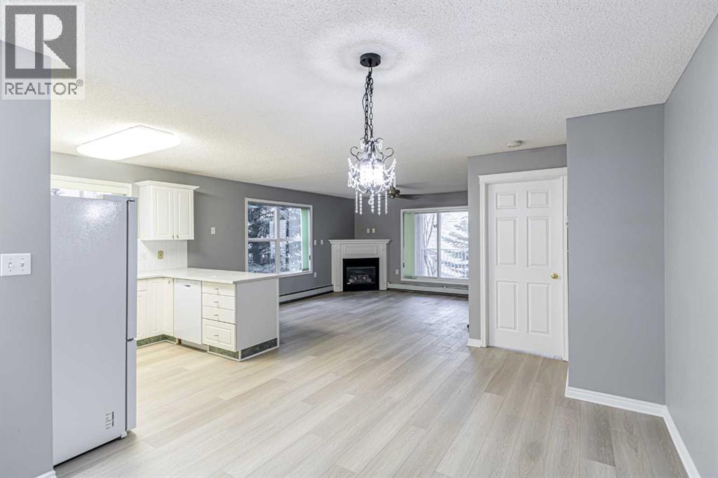 216, 6800 Hunterview Drive Nw, Calgary, Alberta  T2K 6K5 - Photo 1 - A2278413