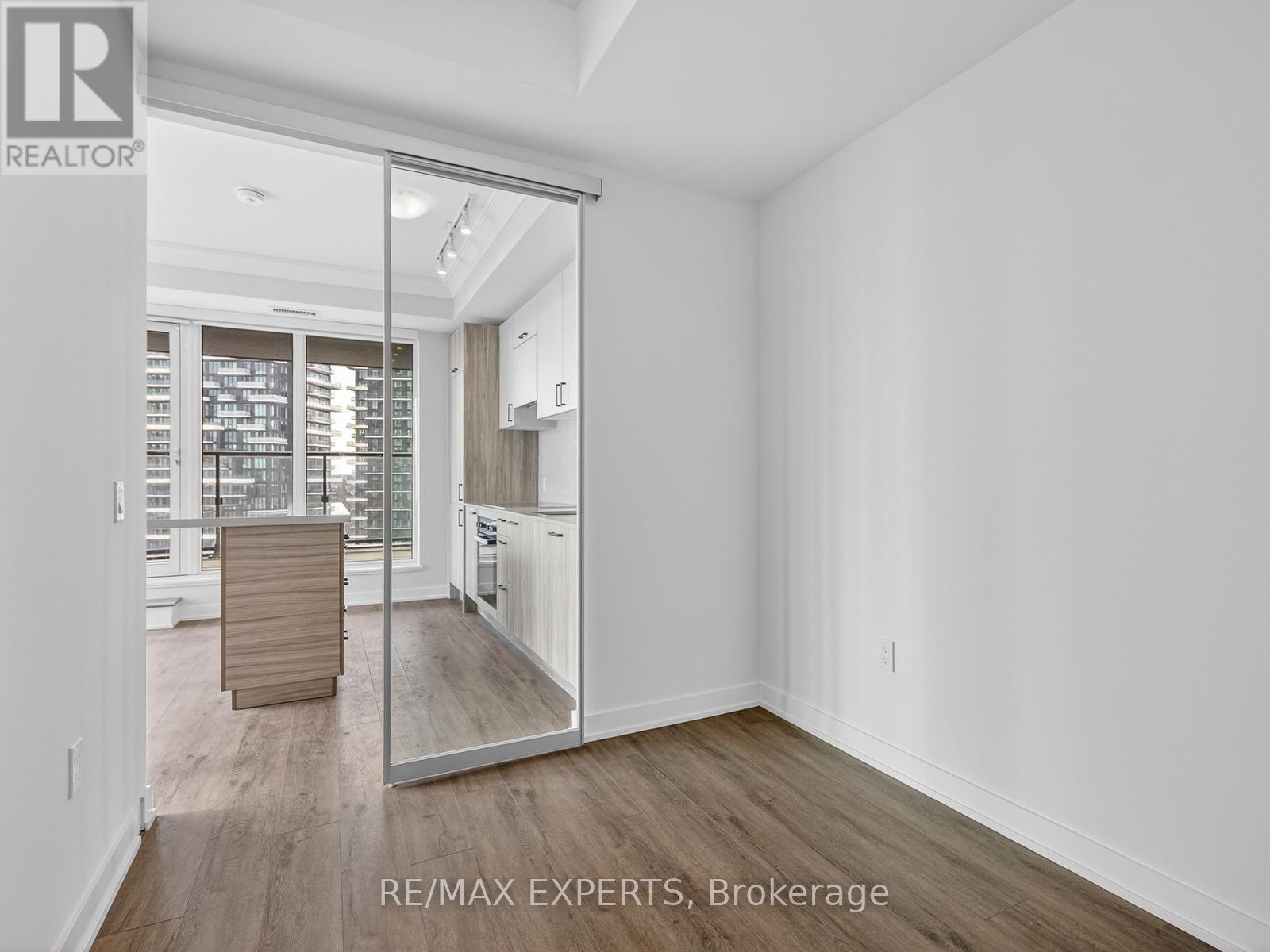 1714 - 1 Quarrington Lane, Toronto, Ontario  M3C 0S4 - Photo 2 - C12777780