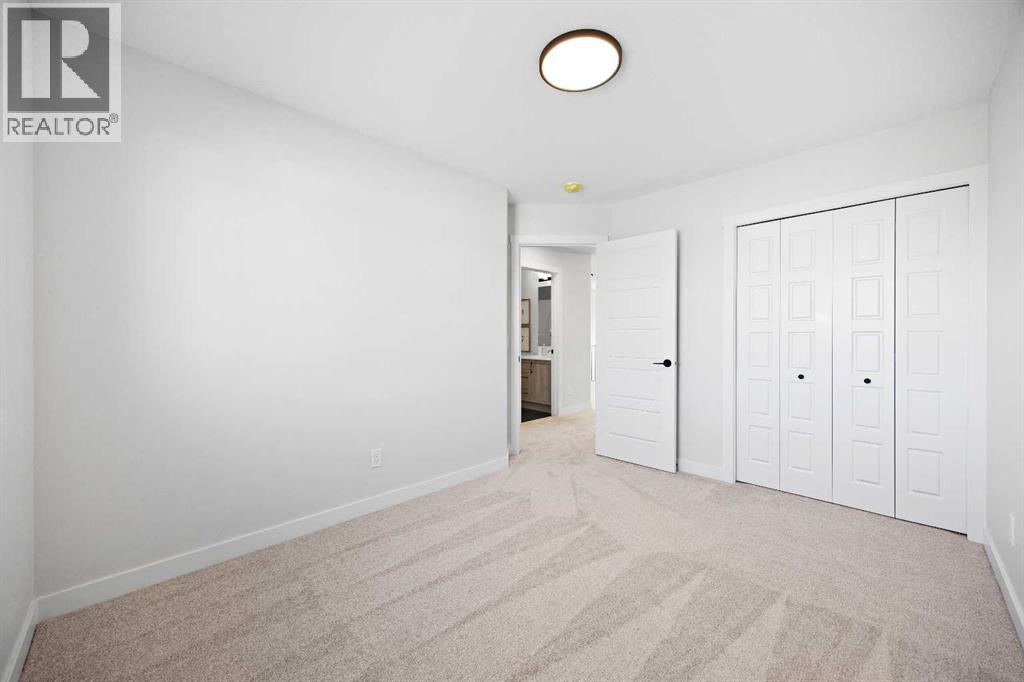 64 Fireside Common, Cochrane, Alberta  T4C 3H9 - Photo 34 - A2254435