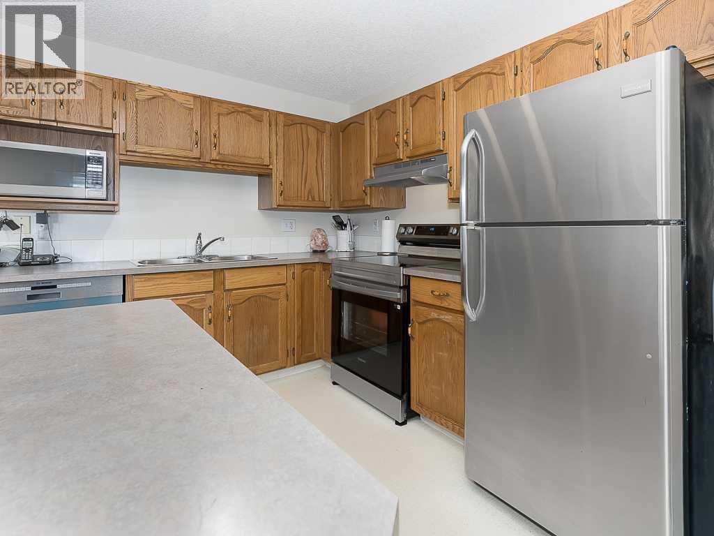 119 Mt Douglas Manor Se, Calgary, Alberta T2Z 3C8 - Photo 4 - A2276762