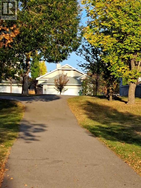 76 Tuscany Way Nw, Calgary, Alberta  T3L 2A4 - Photo 30 - A2284441