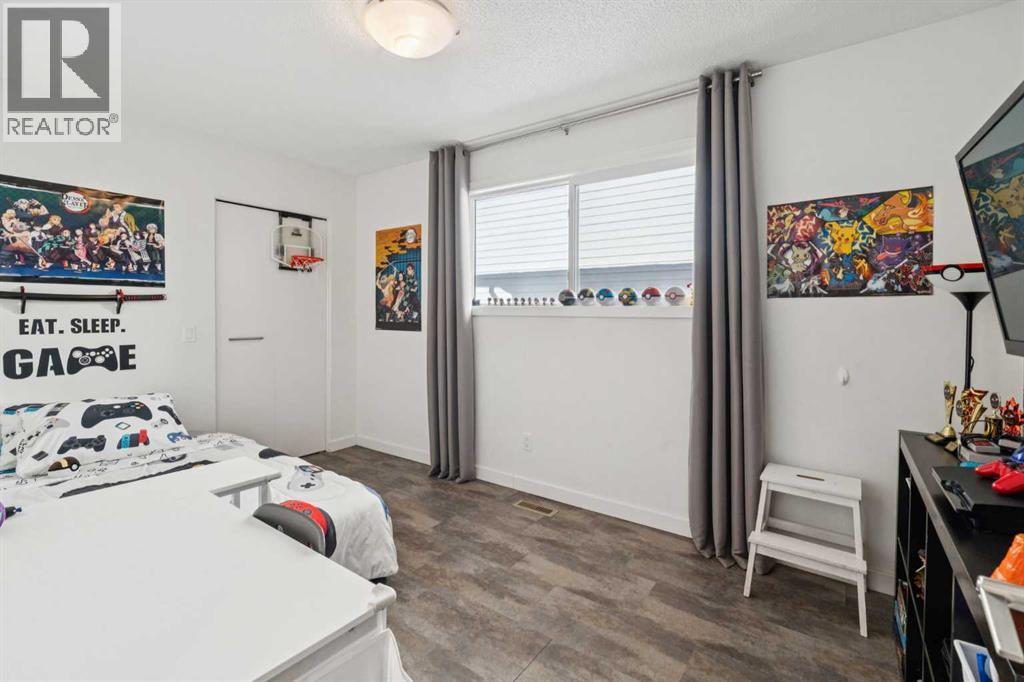 65 Tararidge Close Ne, Calgary, Alberta  T3J 2P5 - Photo 18 - A2283819