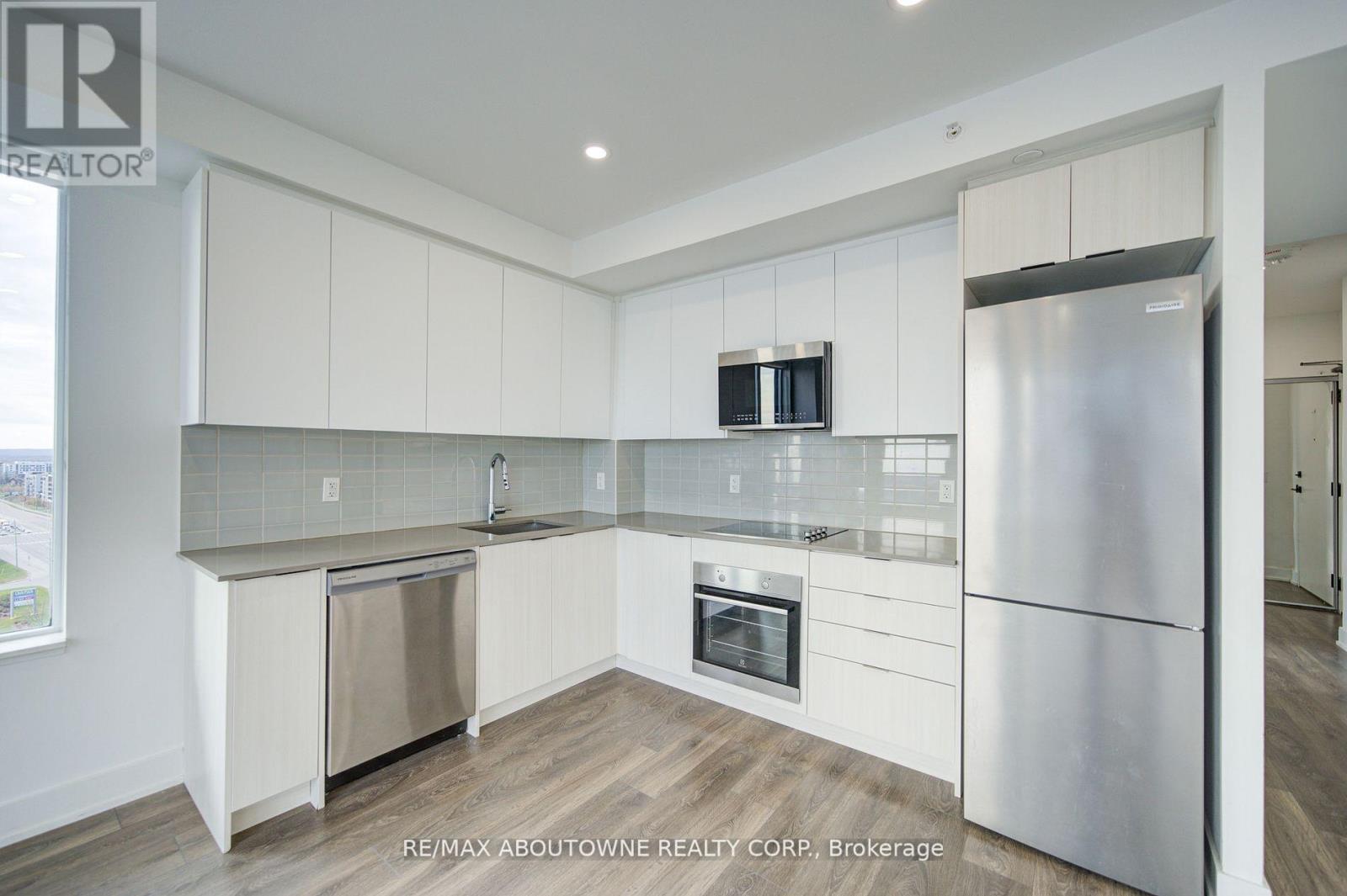 1313 - 2489 Taunton Road, Oakville, Ontario  L6H 3R7 - Photo 5 - W12778062