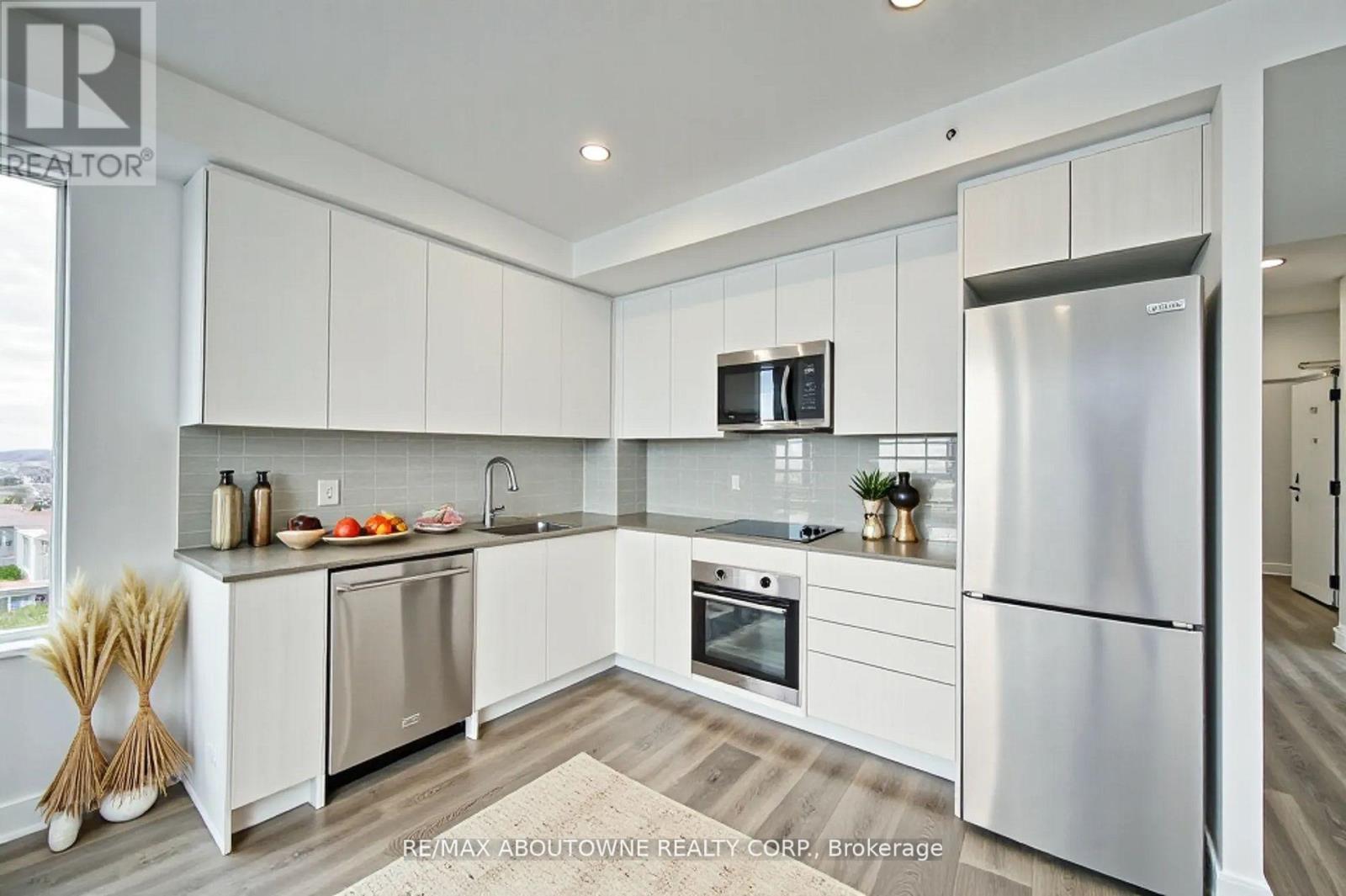 1313 - 2489 Taunton Road, Oakville, Ontario  L6H 3R7 - Photo 6 - W12778062