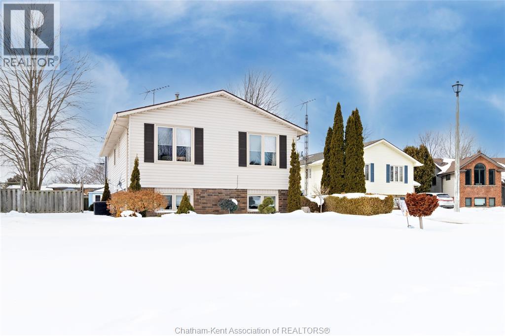 Welcome to 920 Daleview Crescent in Dresden Ontario!  This 5 Bedroom (3+2), 1.5 Bathroom 'Raised Ranch' sits on a beautifully landscaped lot located on a quiet cul-de-sac close to restaurants, schools and shopping!  The main floor features a spacious Living Room and Dining Area with laminate hardwood floors, an updated Kitchen with stainless steel appliances, 3 good sized Bedrooms and a lovely 4-Pc Bath.  The lower level offers 2 more large Bedrooms, a warm and cozy Family Room with Gas Fireplace, Laundry Room, remodeled half Bath and plenty of storage.  The yards boast beautiful gardens in the summer, a ""Living Rock"", a 10x12 Gazebo, 2 Sheds and a concrete drive for off-street parking.  Newer interior doors, Furnace & A/C, and replacement windows round out the list of features that make this property the perfect place for you to call your next ""home""! (id:48254)