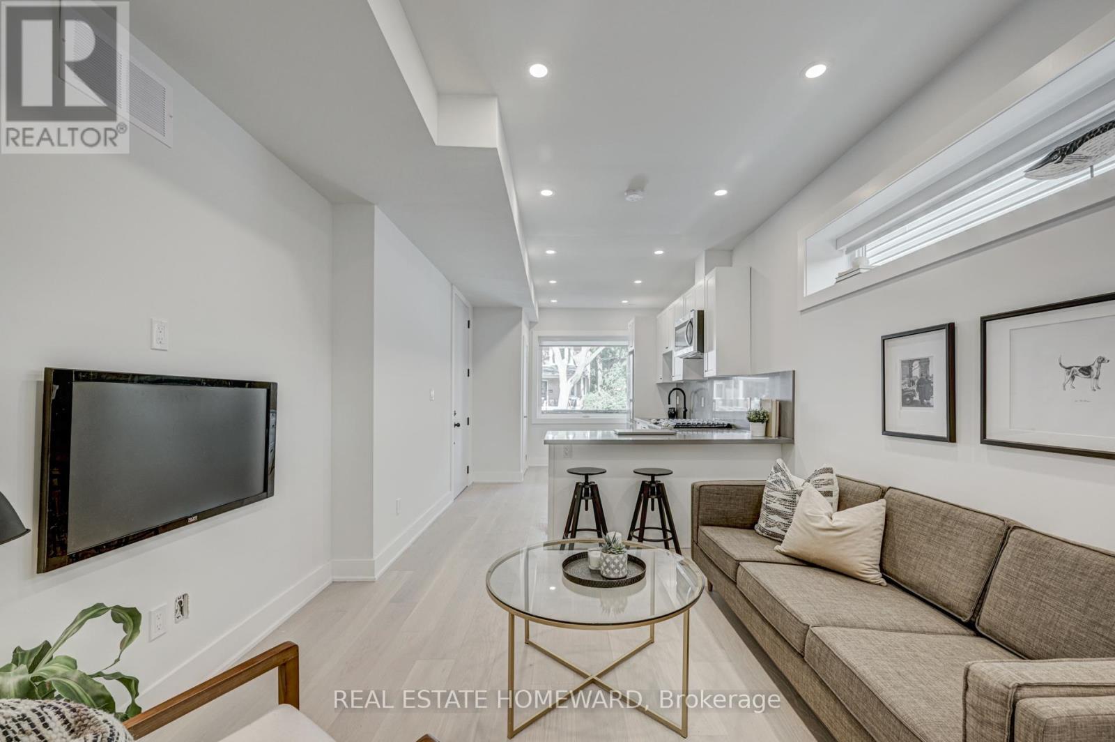 A - 40 Dewhurst Boulevard, Toronto, Ontario  M4J 3H9 - Photo 5 - E12778614