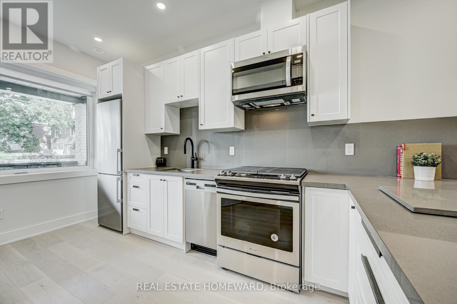 A - 40 Dewhurst Boulevard, Toronto, Ontario  M4J 3H9 - Photo 8 - E12778614