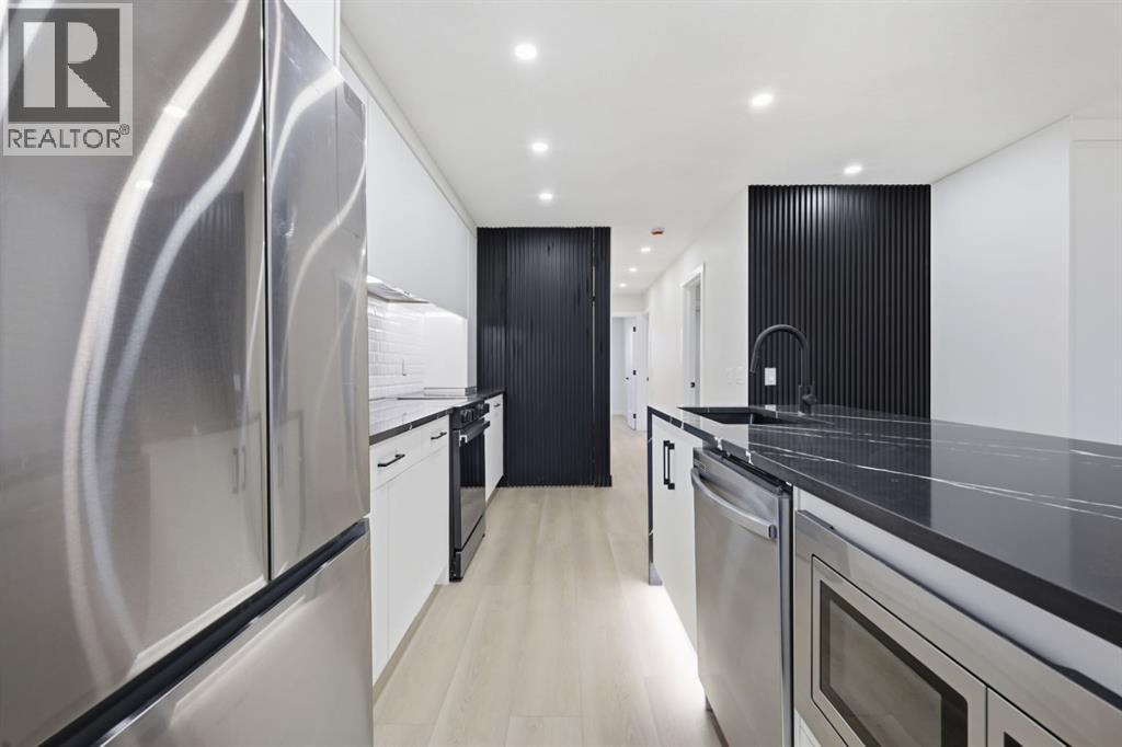 8426 Berkley Road Nw, Calgary, Alberta  T3K 1B4 - Photo 15 - A2283794