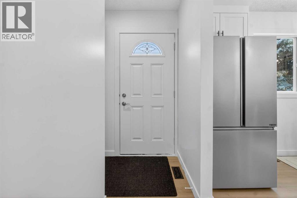 8, 14736 Deerfield Drive Se, Calgary, Alberta  T2J 5Y1 - Photo 4 - A2285188