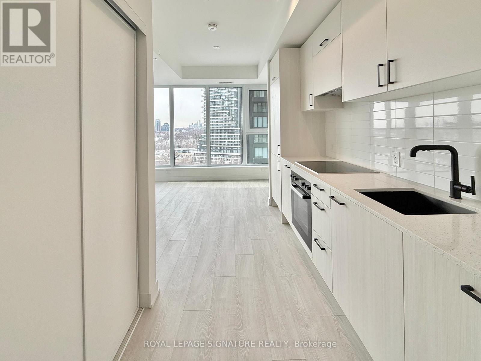 1204 - 1 Quarrington Lane, Toronto, Ontario  M3C 0S4 - Photo 2 - C12779550