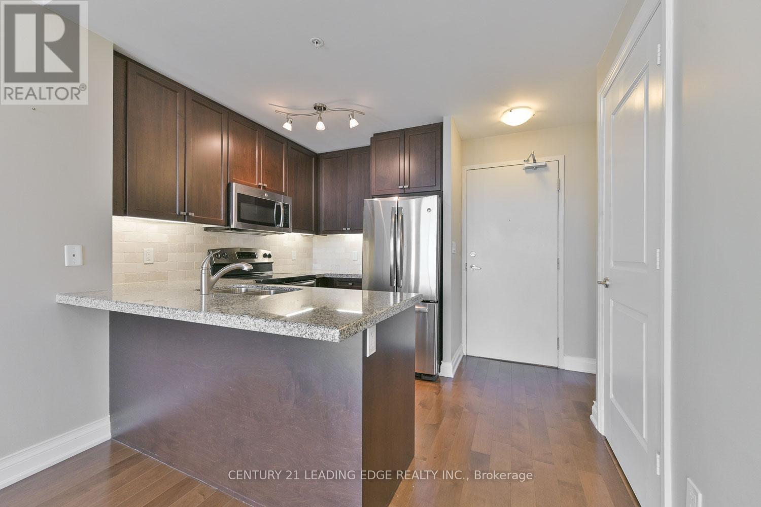 604 - 68 Main Street N, Markham (Old Markham Village), Ontario  L3P 0N5 - Photo 4 - N12779468