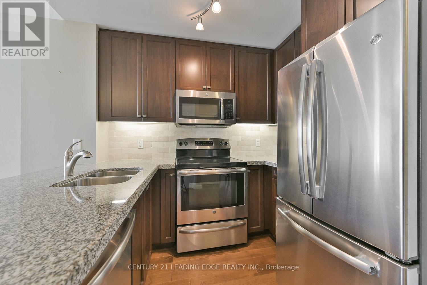 604 - 68 Main Street N, Markham (Old Markham Village), Ontario  L3P 0N5 - Photo 5 - N12779468