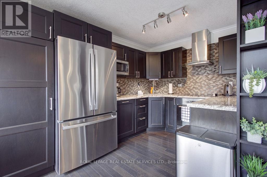 410 - 1110 Walden Circle, Mississauga, Ontario  L5J 4R3 - Photo 8 - W12779480