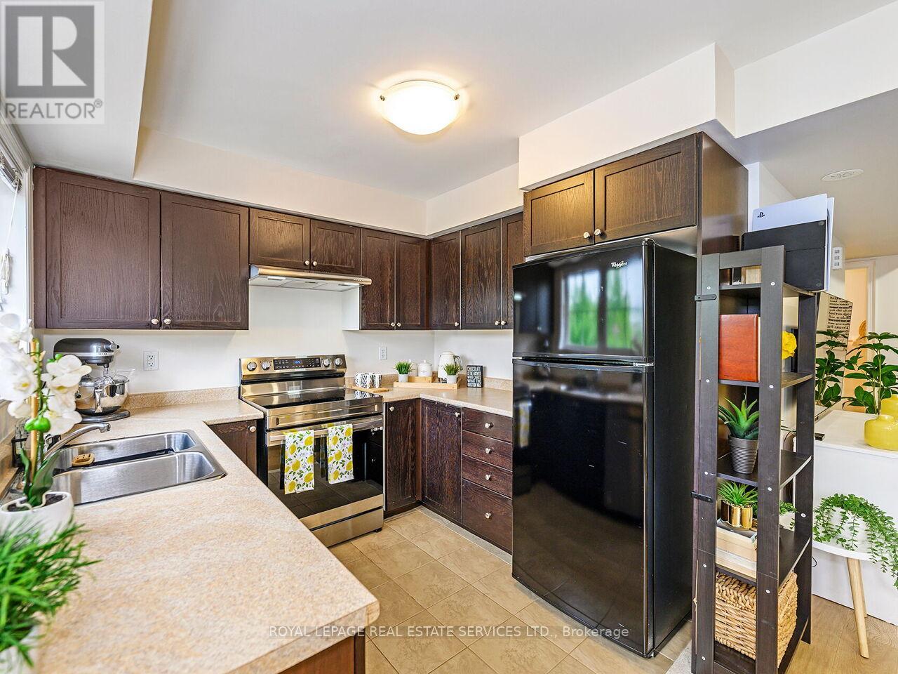 Unit 12 - 19 Hays Boulevard, Oakville, Ontario  L6H 0H8 - Photo 8 - W12779516