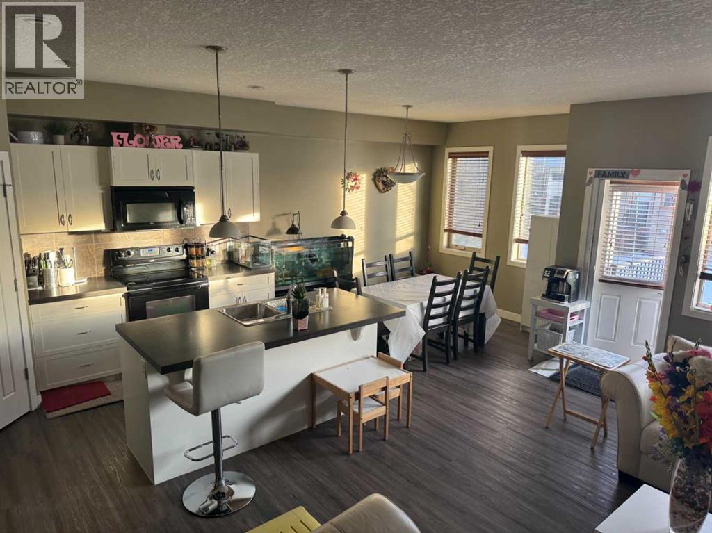 311, 413 River Avenue, Cochrane, Alberta  T4C 0P2 - Photo 3 - A2282389