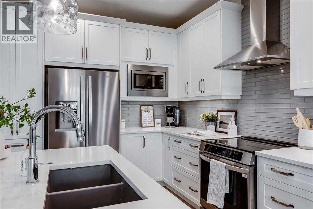 1621 Bayside Green Sw, Airdrie, Alberta  T4B 5E8 - Photo 7 - A2284313