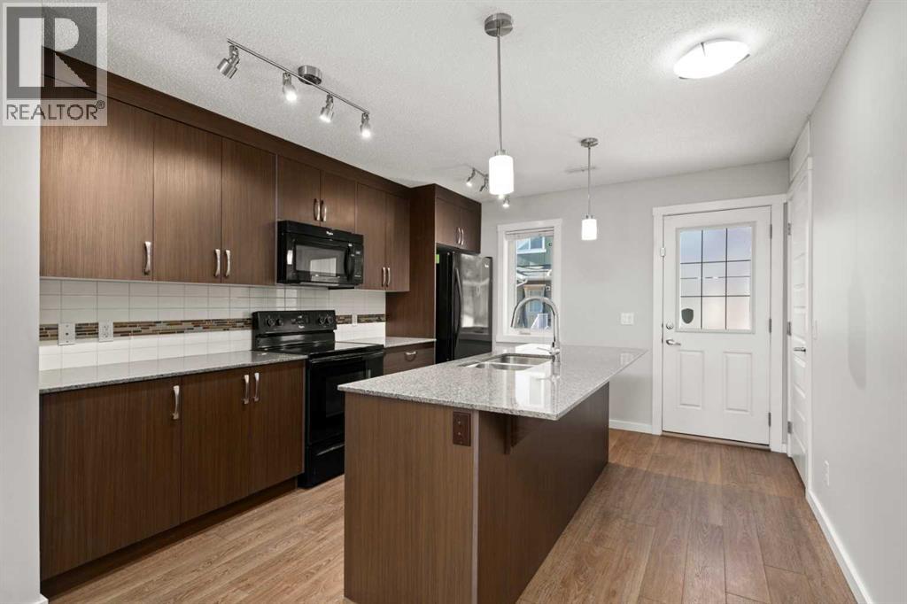 509 Auburn Bay Circle Se, Calgary, Alberta T3M 2A2 - Photo 2 - A2282870