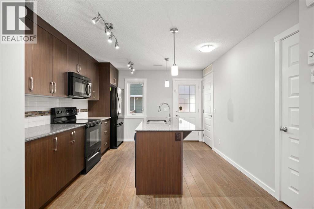 509 Auburn Bay Circle Se, Calgary, Alberta T3M 2A2 - Photo 4 - A2282870