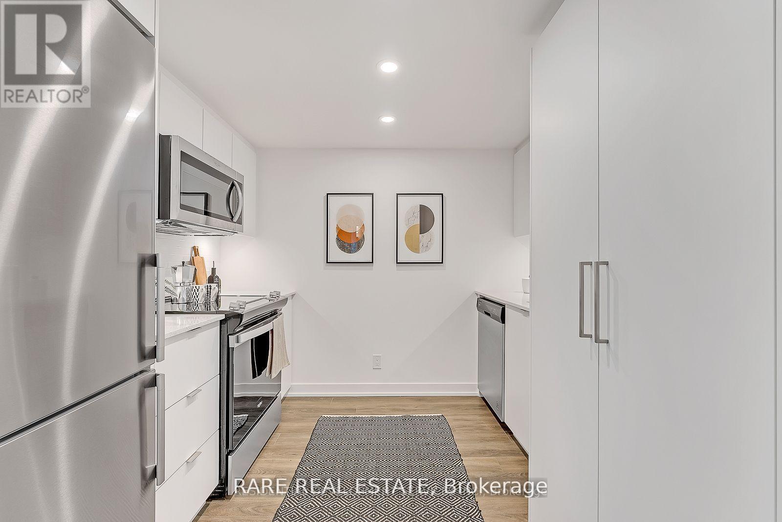 318 - 30 Tretti Way, Toronto, Ontario  M3H 0E3 - Photo 3 - C12779870