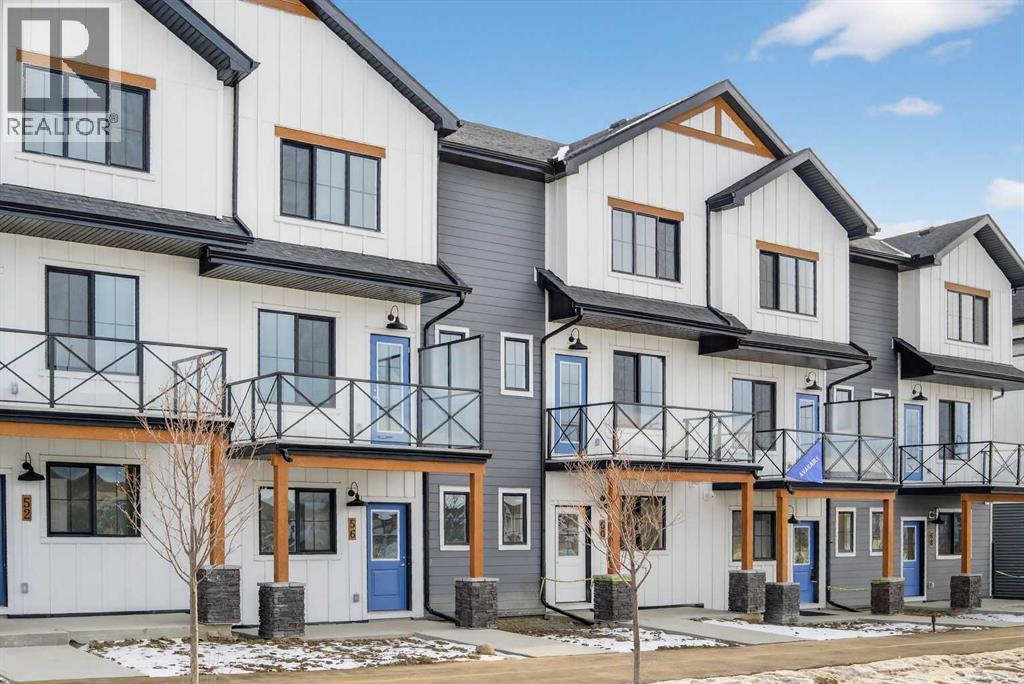 56 Creekside Drive Sw, Calgary, Alberta  T2X 6E2 - Photo 1 - A2282815