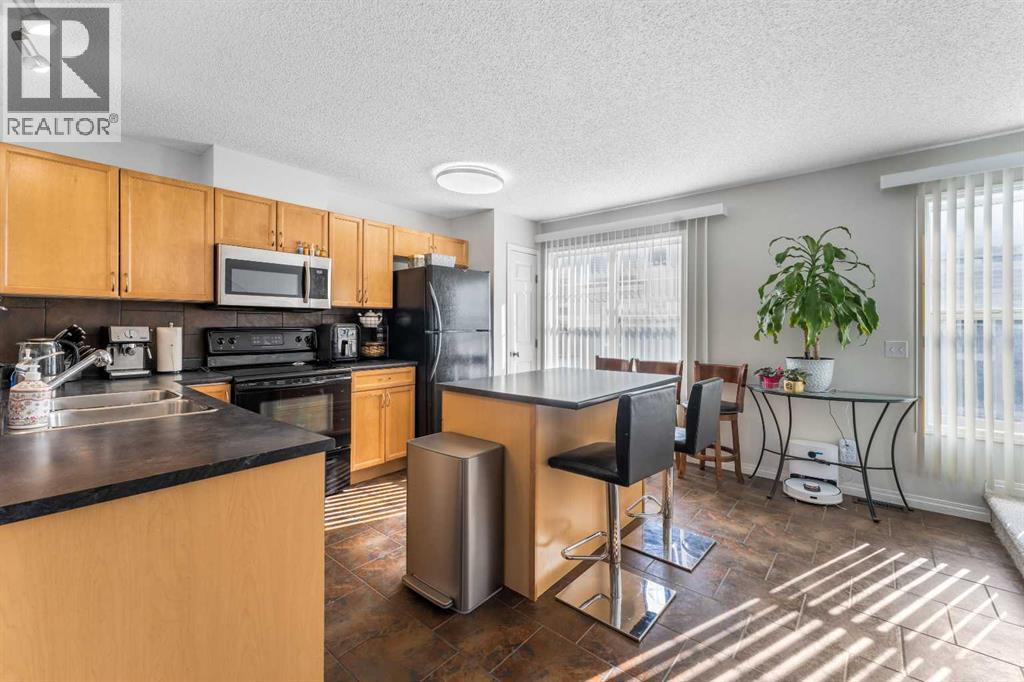 3305 New Brighton Gardens Se, Calgary, Alberta  T2Z 0A2 - Photo 11 - A2285675