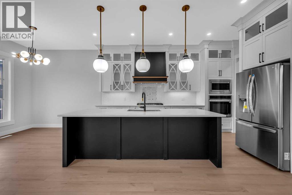 203 Kinniburgh Place, Chestermere, Alberta  T1X 1Y1 - Photo 11 - A2285716