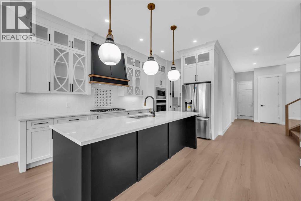 203 Kinniburgh Place, Chestermere, Alberta  T1X 1Y1 - Photo 12 - A2285716