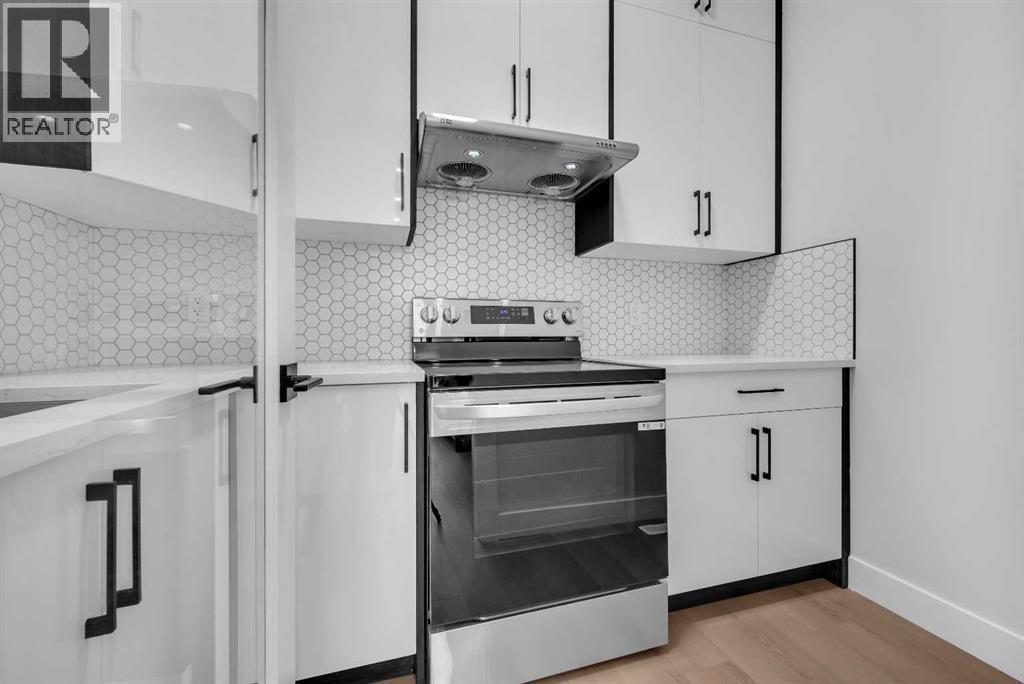 203 Kinniburgh Place, Chestermere, Alberta  T1X 1Y1 - Photo 17 - A2285716