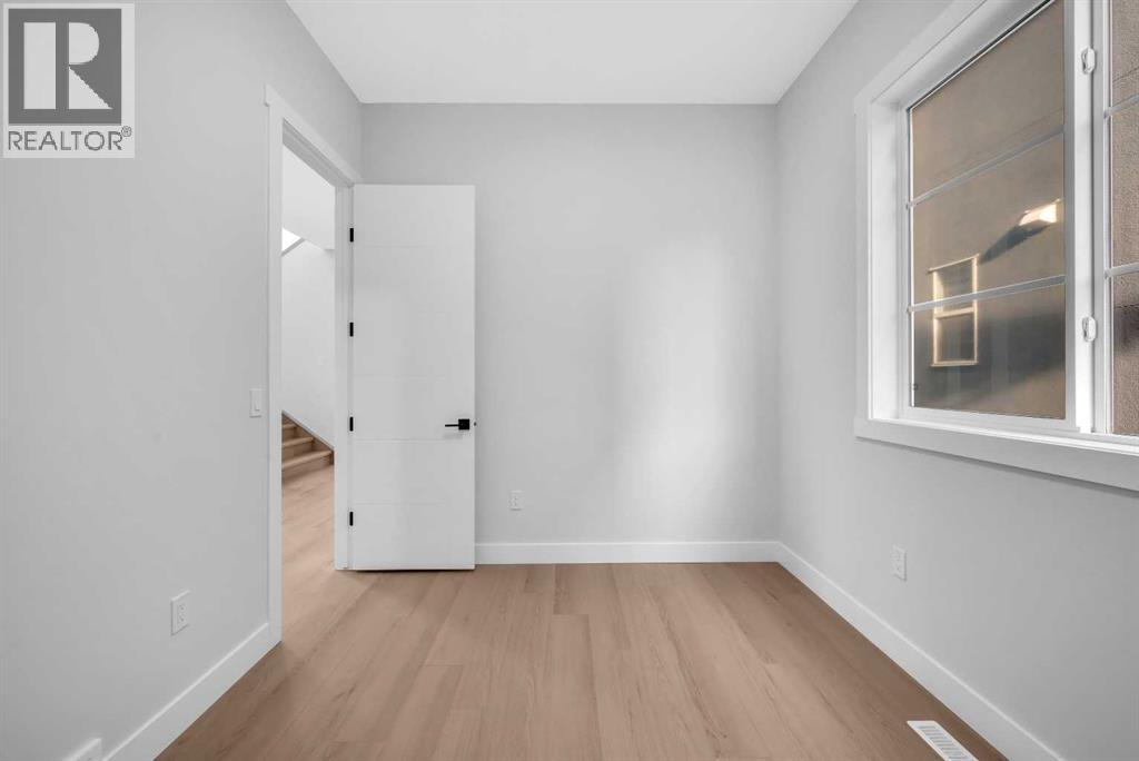 203 Kinniburgh Place, Chestermere, Alberta  T1X 1Y1 - Photo 21 - A2285716