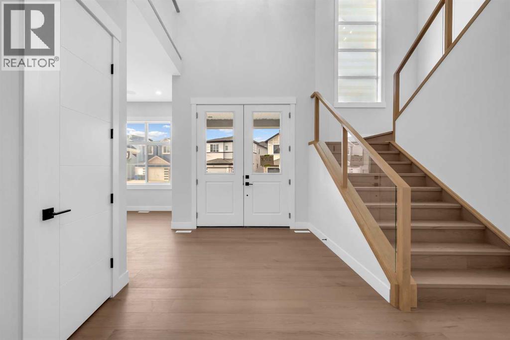 203 Kinniburgh Place, Chestermere, Alberta  T1X 1Y1 - Photo 5 - A2285716