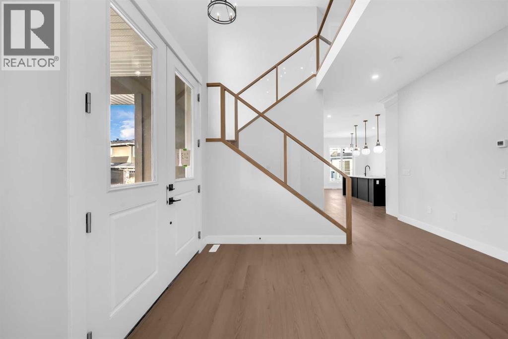 203 Kinniburgh Place, Chestermere, Alberta  T1X 1Y1 - Photo 6 - A2285716