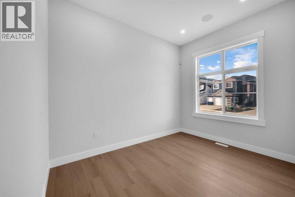 203 Kinniburgh Place, Chestermere, Alberta  T1X 1Y1 - Photo 7 - A2285716